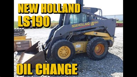 how to change oil new holland skid steer|new holland oil change videos.